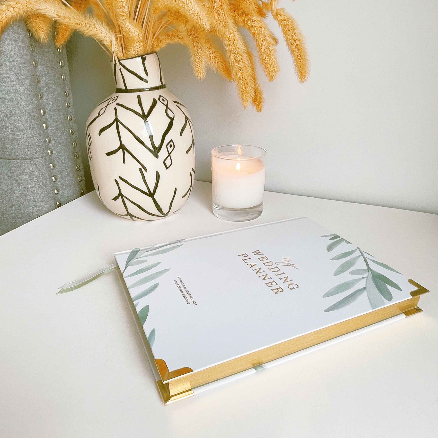 Luxury eucalyptus wedding planner book with gilded edge